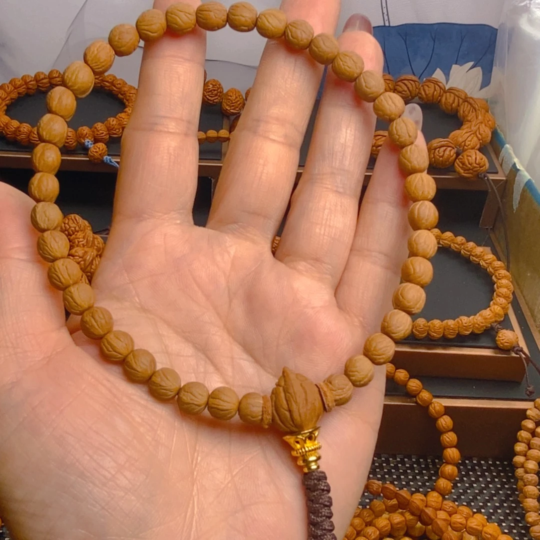 七***比吊坠桃核0.655555555555