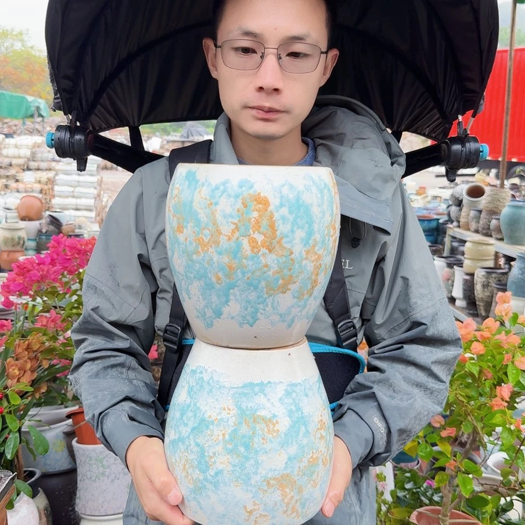 紫砂花盆口18高21（两个姹寂蛋壳工艺品