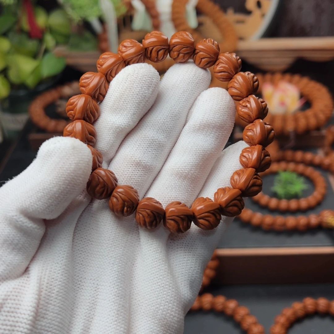 吊坠桃核毅*1.4双脊龙手串