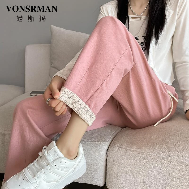 粉色休闲哈伦裤女秋季2025新款宽松高腰显瘦小个子花边萝卜老爹裤