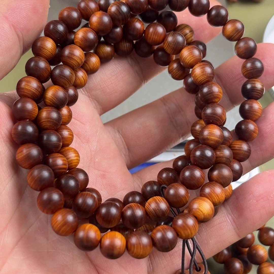 陈***香柏木无事牌0.8.108黑油骨料