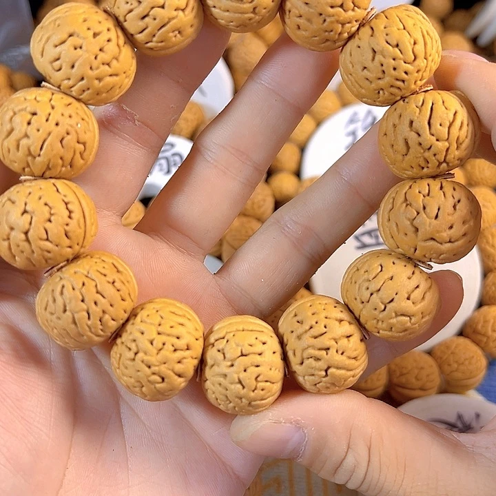 合***乐桃核手串国核滚像桃核手串
