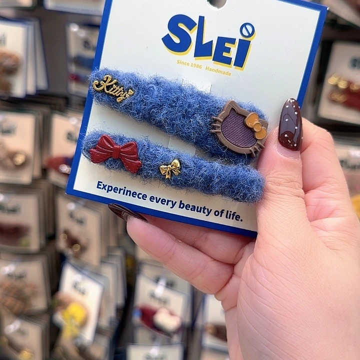 蓝色kt红蝴蝶结发夹