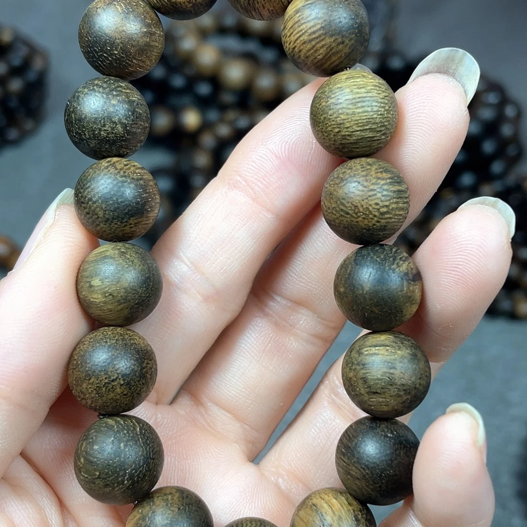 用***4沉香手串芽庄白棋