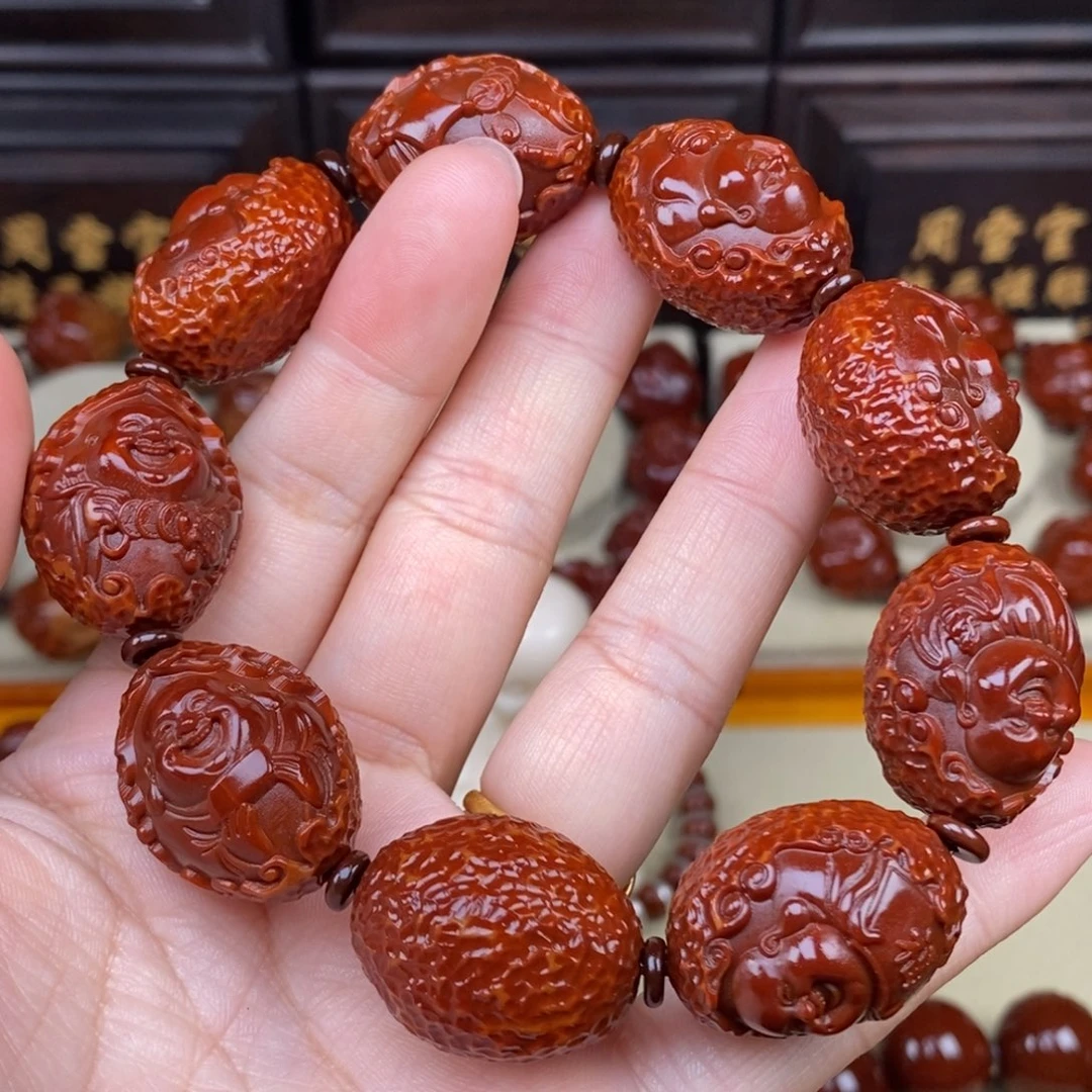 郑***虹吊坠橄榄核弥勒弥勒