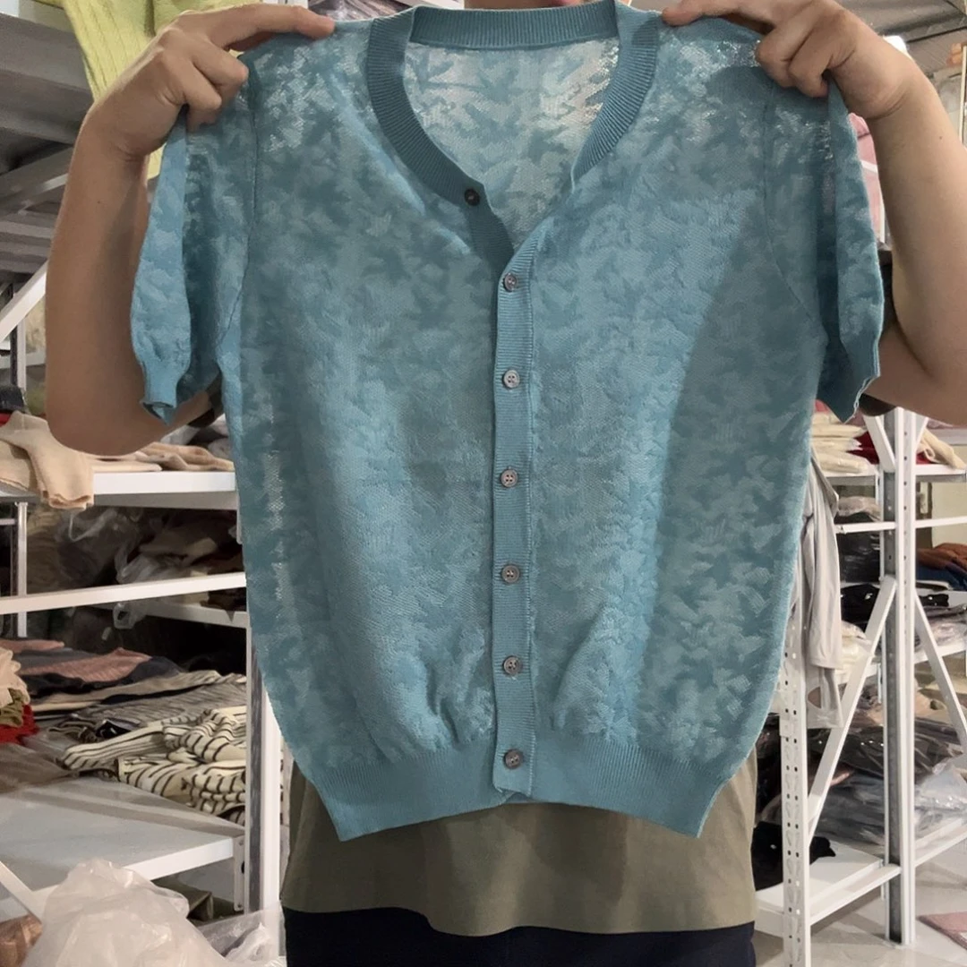 湖蓝色欧根纱开衫一叉130斤