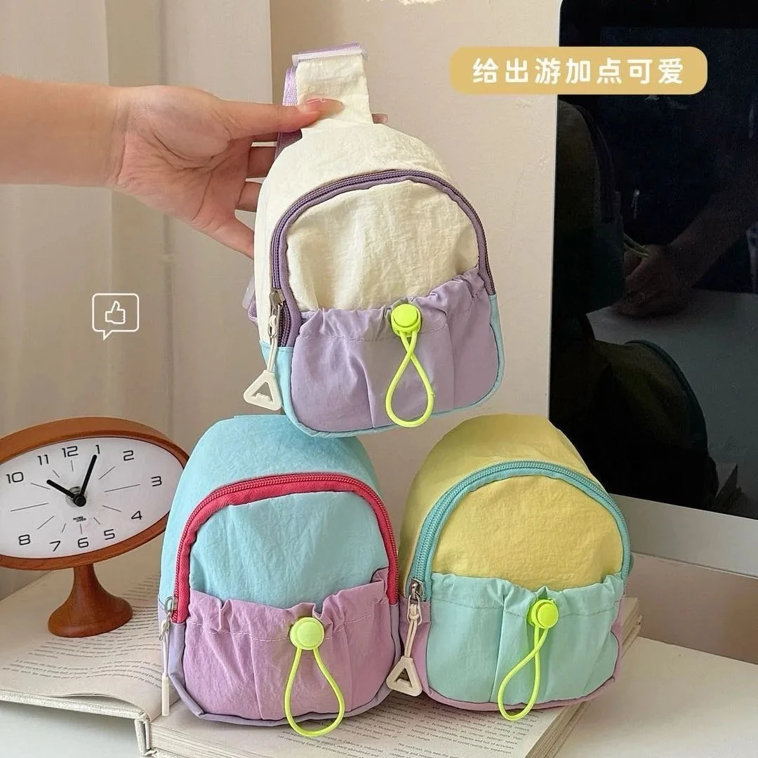 2025新款时尚幼儿园儿童包收纳男童宝宝外出收纳袋帅气女孩斜挎包