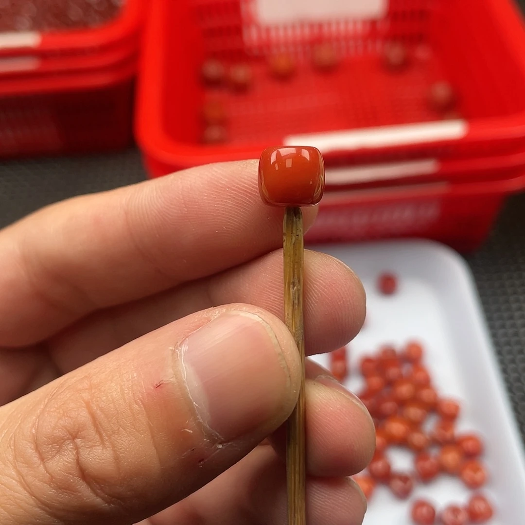 南红玛瑙44号直切柿子红 7*9单珠未镶嵌