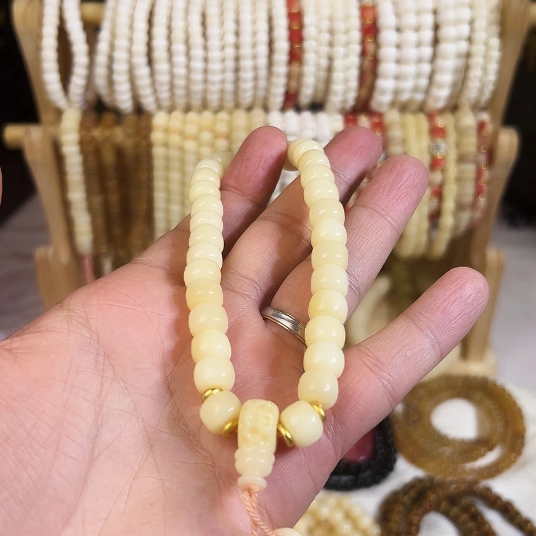 桃核把件1.0驼牙手持