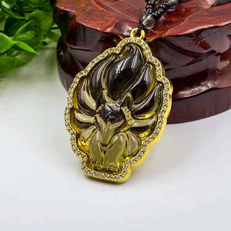 圆山珠宝佑恩设计多彩镶钻九尾狐黄吊坠