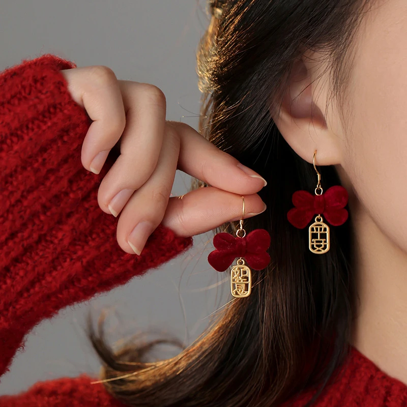 合金耳饰 秋冬红色毛绒蝴蝶结平安如意新年喜庆耳环个性独特耳饰