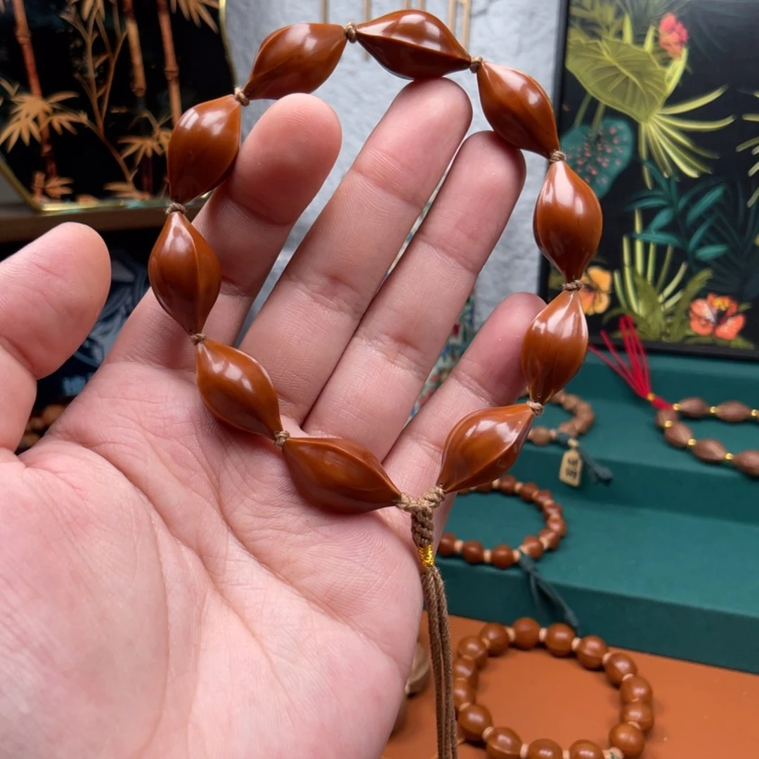 橄榄核手串/手链嘟***爸1.3梅林油核直心三面佛手串