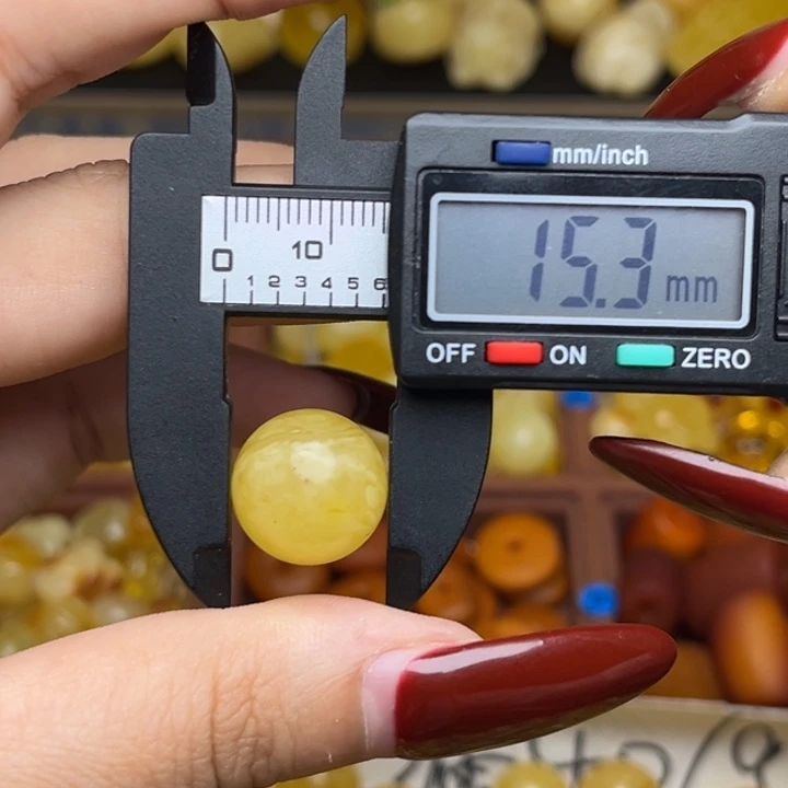 蜜蜡未镶嵌珠宝奇石鸡油黄满蜡妖花圆珠微瑕