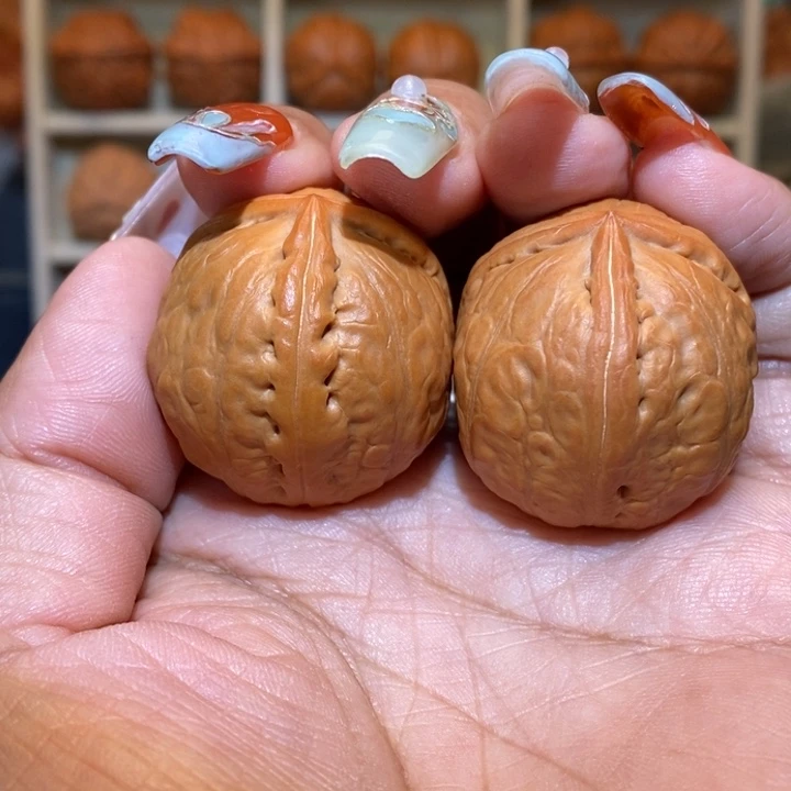 俩***金把件文玩核桃手捻