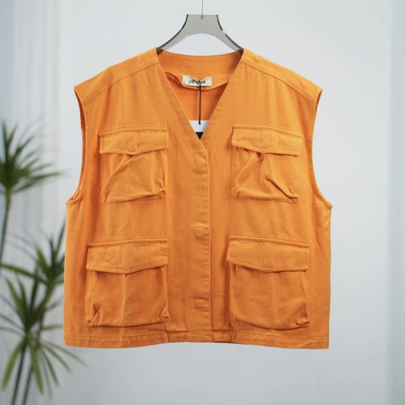 尚系列  Z047  女装时尚撤柜牛仔马甲橙色SS07Y98