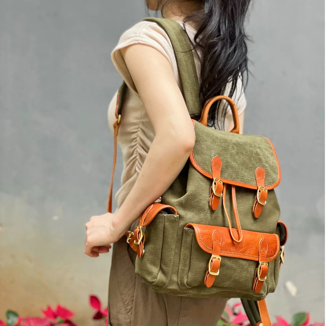 老友皮皮  重磅帆布撞皮双肩背包