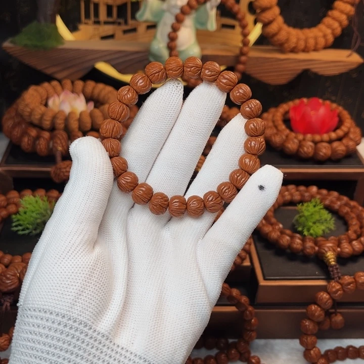 桃核吊坠会**狼11玉龙脊手串