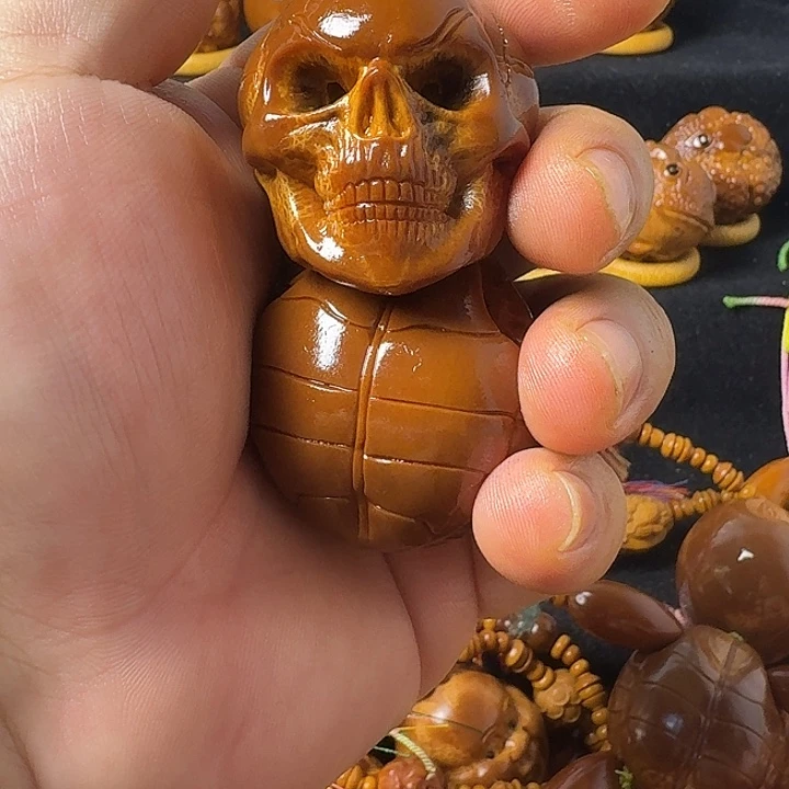 C***0橄榄核吊坠大骷髅富甲