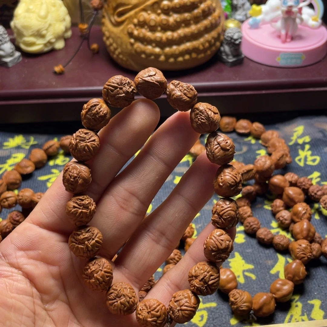 龙纹桃核雕刻瑕疵武金蟾