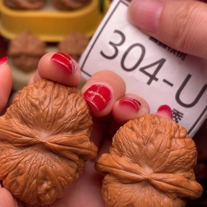 桃核把件元宝42……