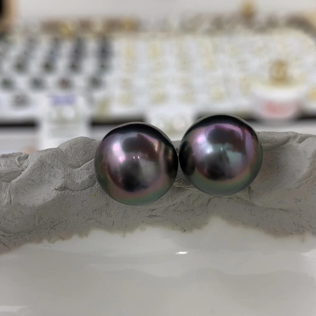 海水珍珠裸珠辣紫色镜面对珠，带瑕疵