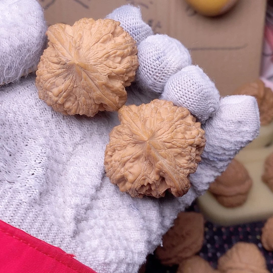 桃核把件一**喝大古石核桃