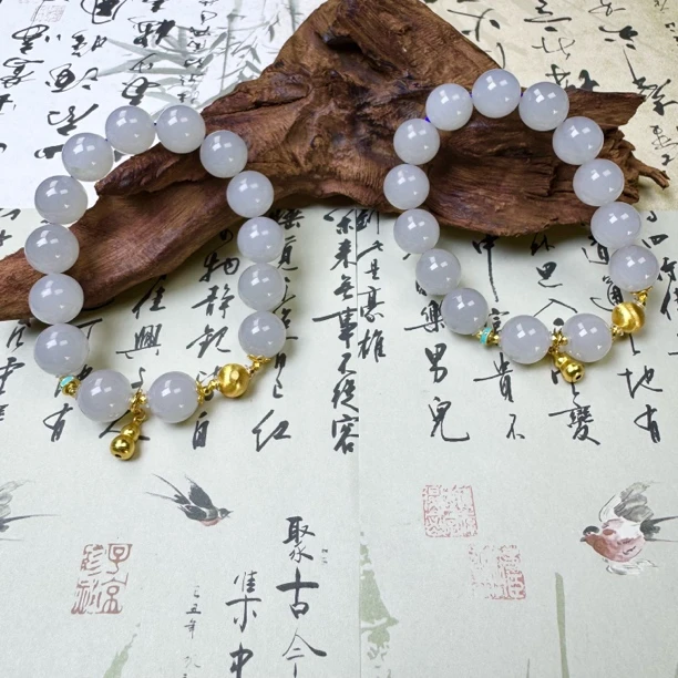 西亚珠宝BY0002 和田玉烟紫卡12手链多样性发货