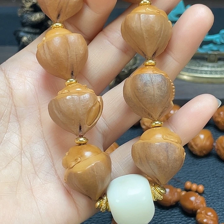 吊坠橄榄核米勒6538c