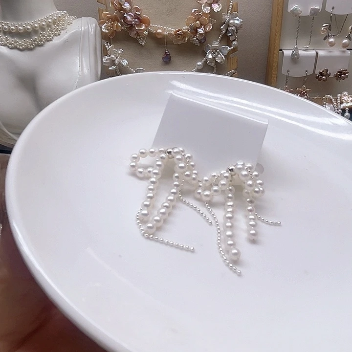 水晶纱保真珍珠蝴蝶结耳钉