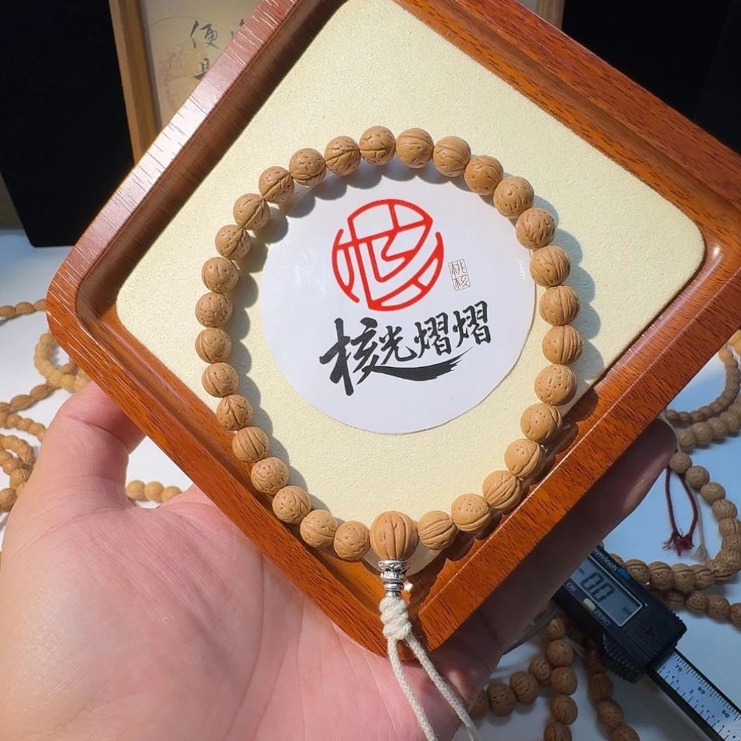 乐***李桃核吊坠野生小黄桃
