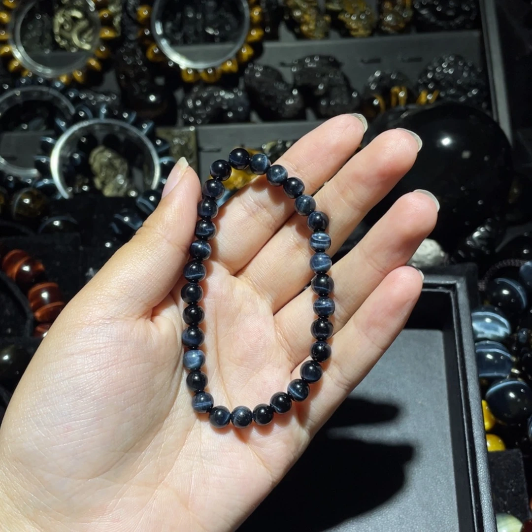 陈***^未镶嵌手链木变石