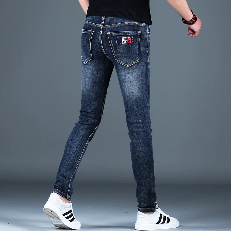 韩俊尼2025爆款男士高端潮流蓝色牛仔裤男装修身小脚百搭休闲韩版