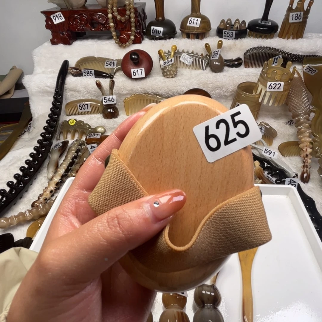 小***拍牛角牛角牛角牛角梳