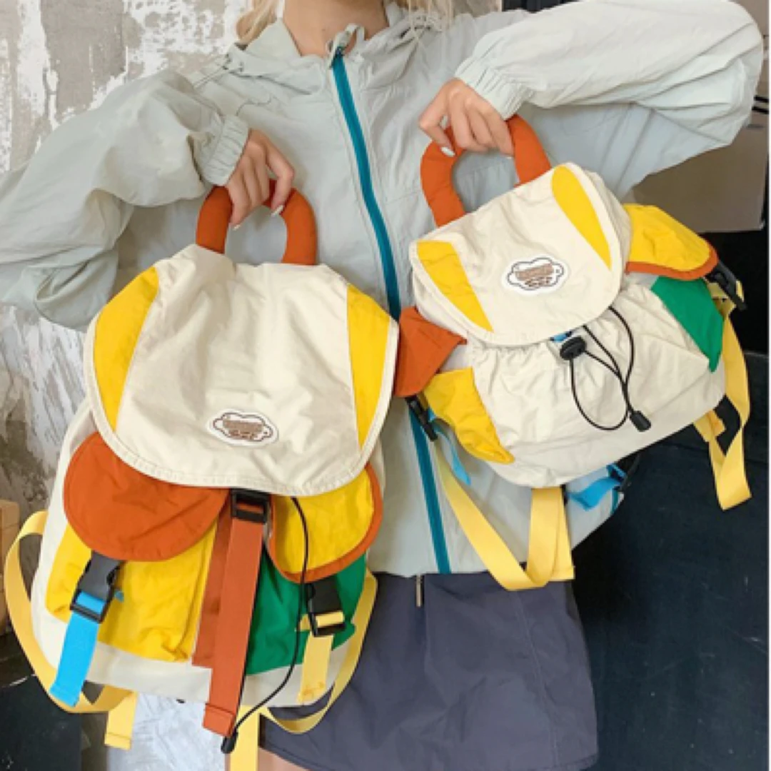 新款学生撞色背包2025新款可爱休闲双肩包旅行包大容量户外轻便