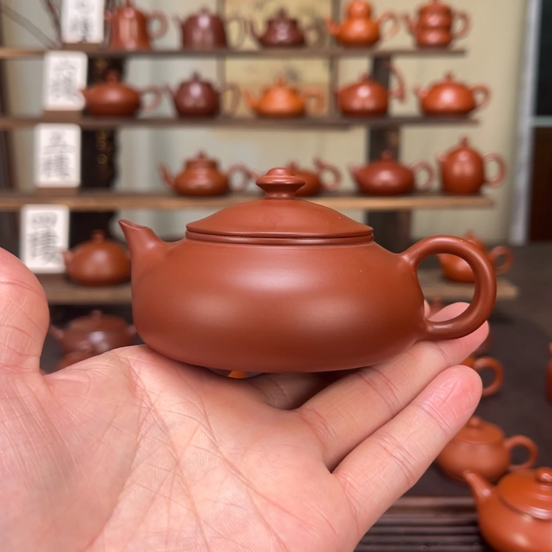 野***家紫砂茶壶老朱泥寒江110cc