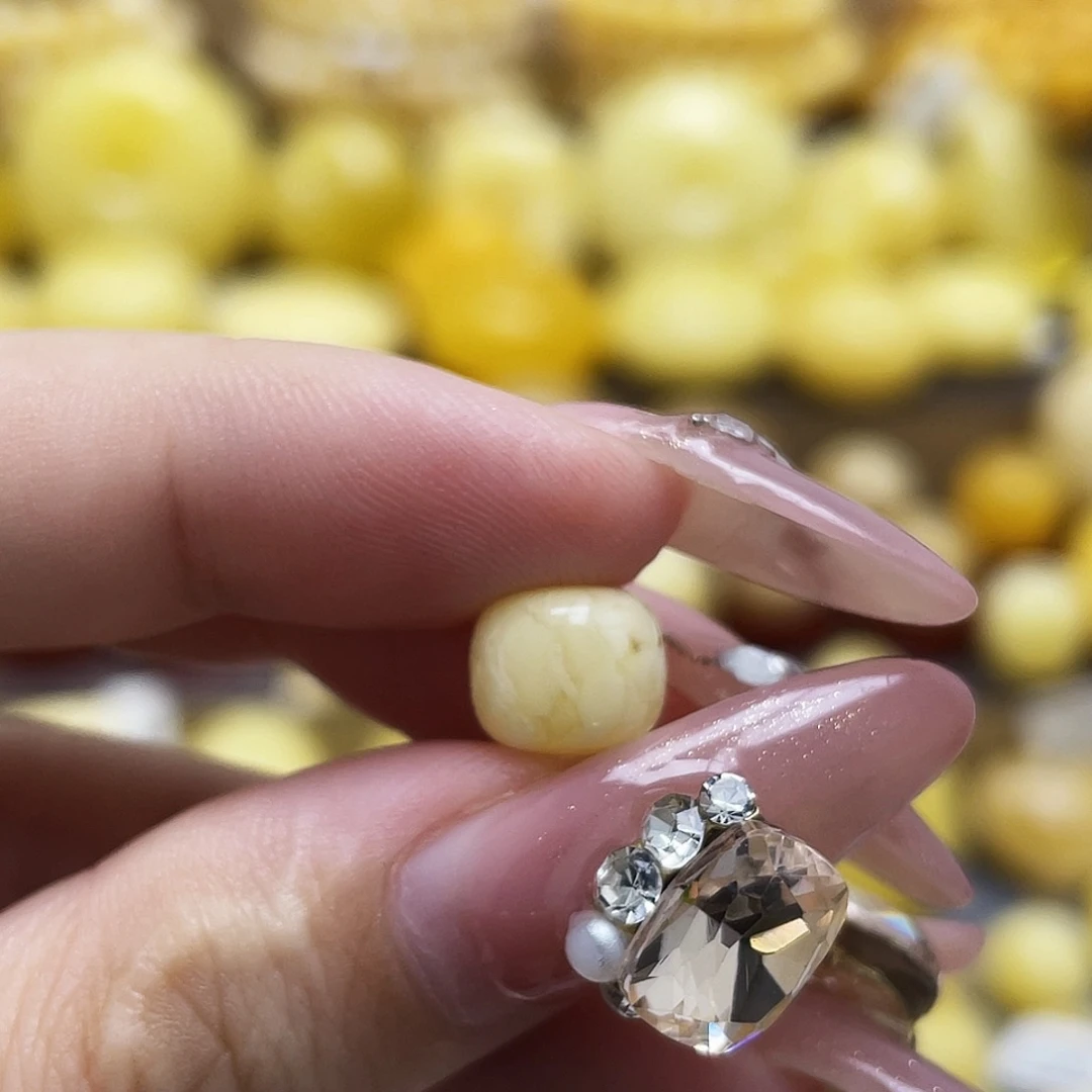 琥珀未镶嵌裸石8.9*7.5mm浓蜡妖花老型瑕