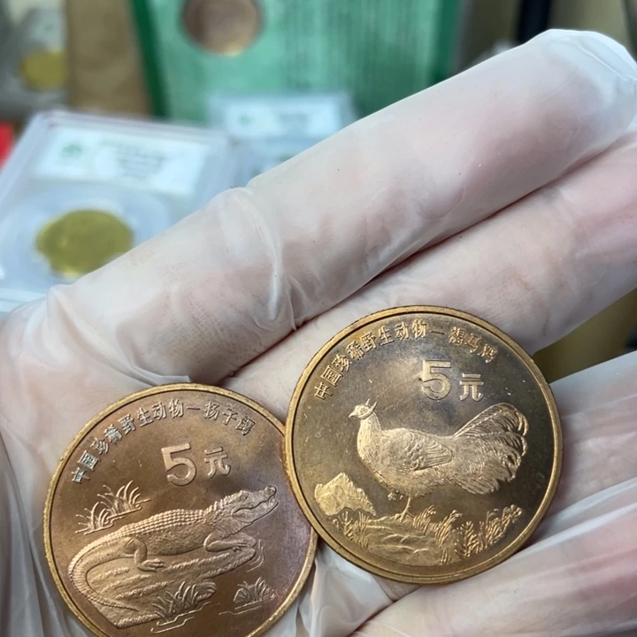 其他普通金属微氧化的动物币一对