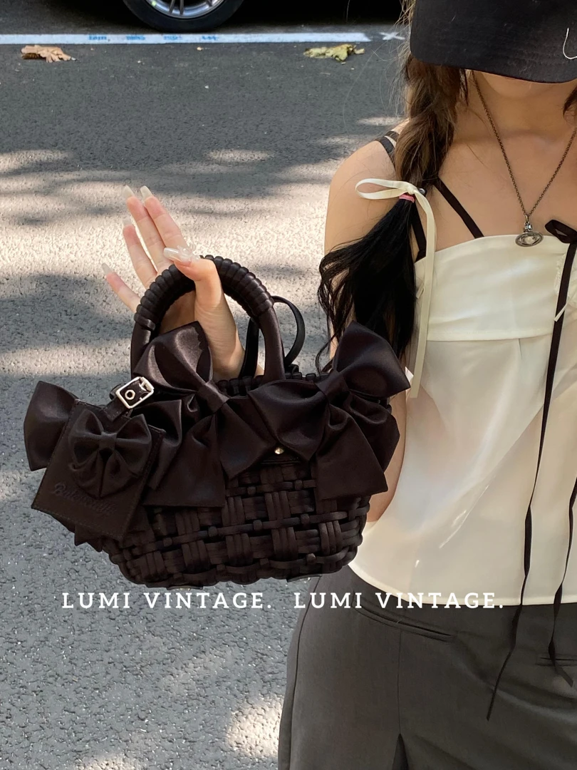 95新 Balenciaga/巴黎世家 黑色缎面蝴蝶结菜篮子单肩包85034748