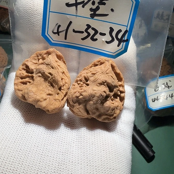 s***a吊坠文玩核桃55号半壁