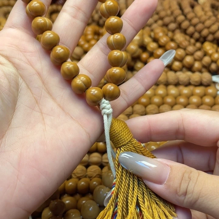 1***.核桃微瑕亮面小屁桃手持