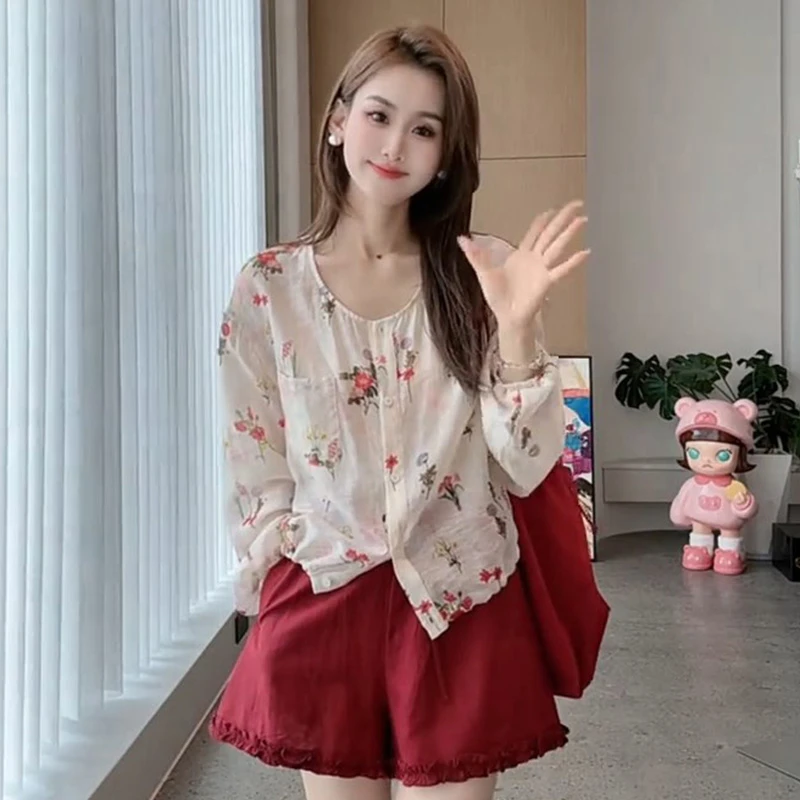 复古港风碎花2025年夏季衬衫女薄款时尚气质圆领宽松显瘦长袖上衣