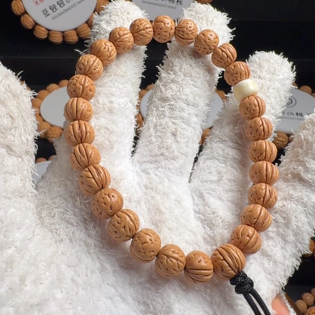 知***之吊坠桃核9+板牙脐野生手持