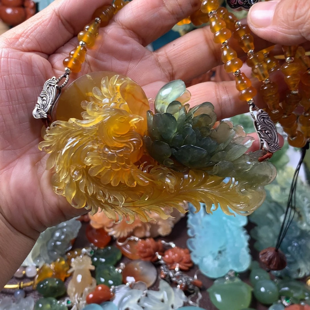 崇***祈未镶嵌蛇纹石玉挂坠