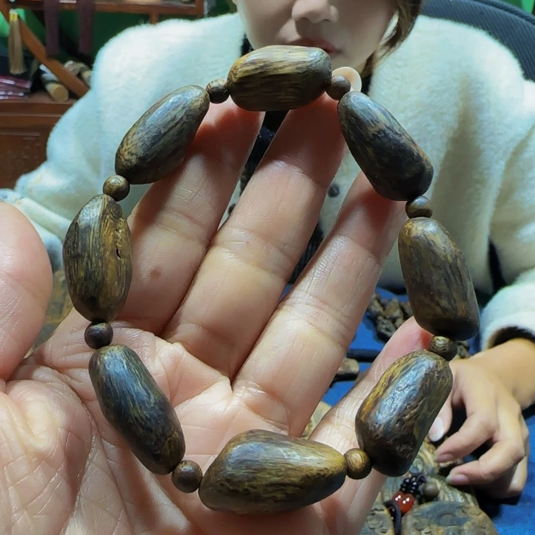 沉香沉香碎屑海南白奇乌身天然瘤疤树丁带绳14.4克