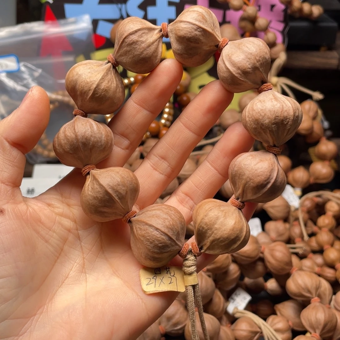 用***8橄榄核吊坠2927四花铁核