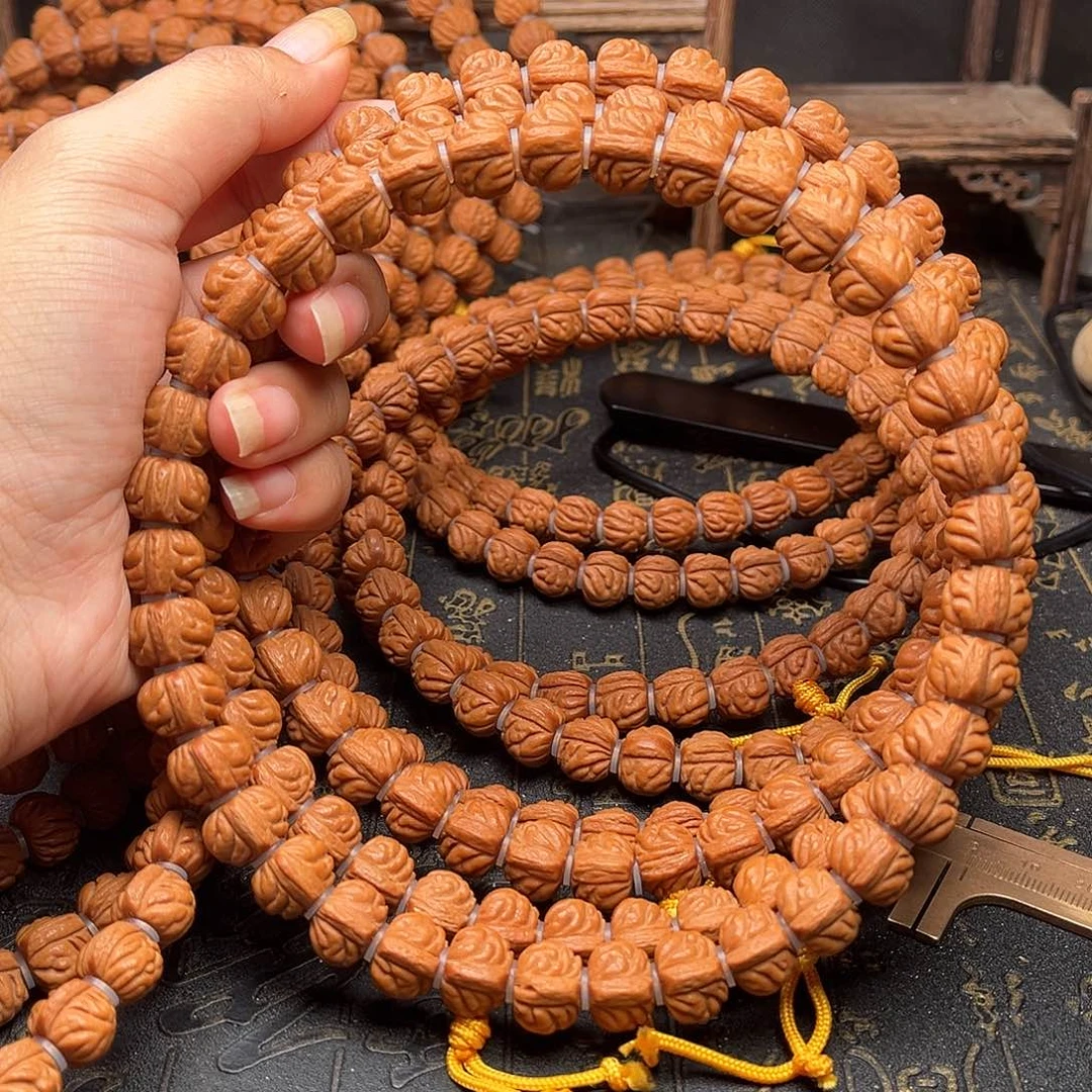 吊坠桃核赤金风雨手持