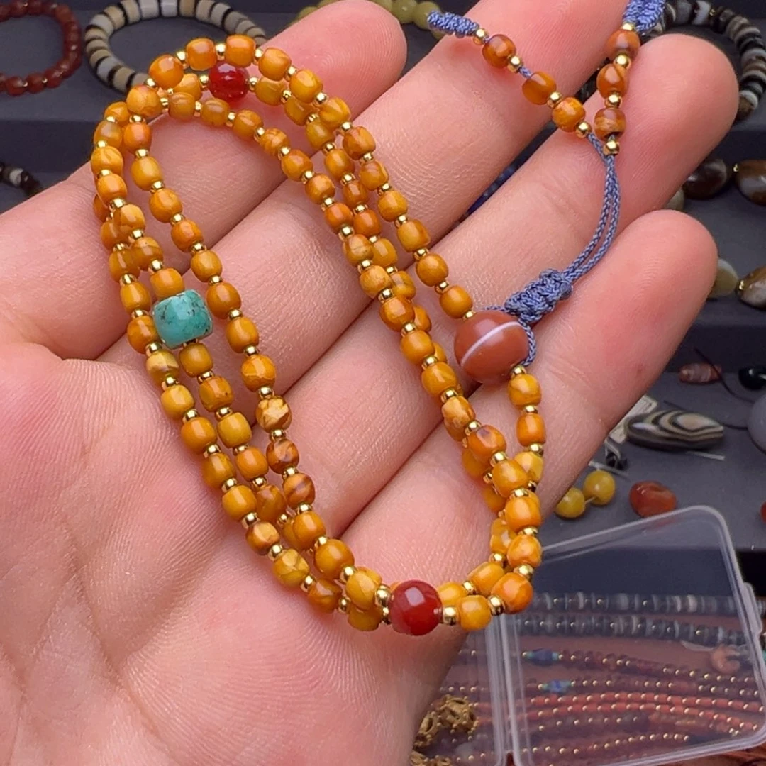 琥珀未镶嵌颈饰蜜蜡