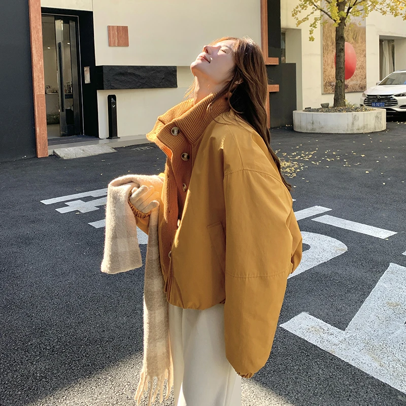 黄色超洋气欧货针织拼接羽绒服女2025冬季新款休闲时尚白鸭绒外套