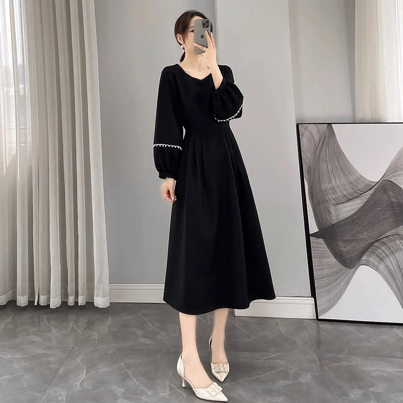 大码黑色连衣裙女春秋2025新款法式收腰显瘦A字裙气质中长款裙子