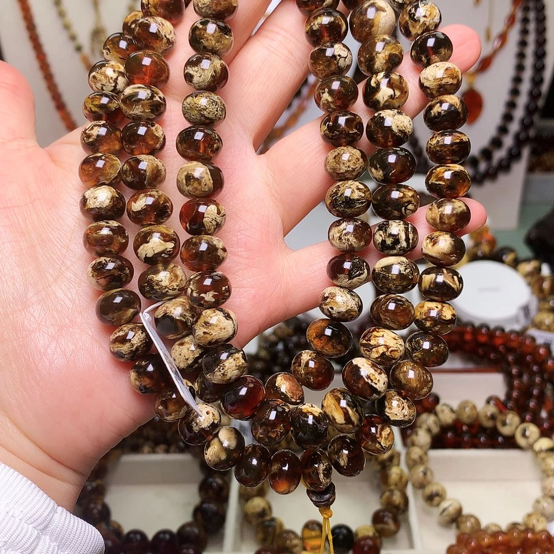 琥珀未镶嵌裸石血底瓷白溶洞11